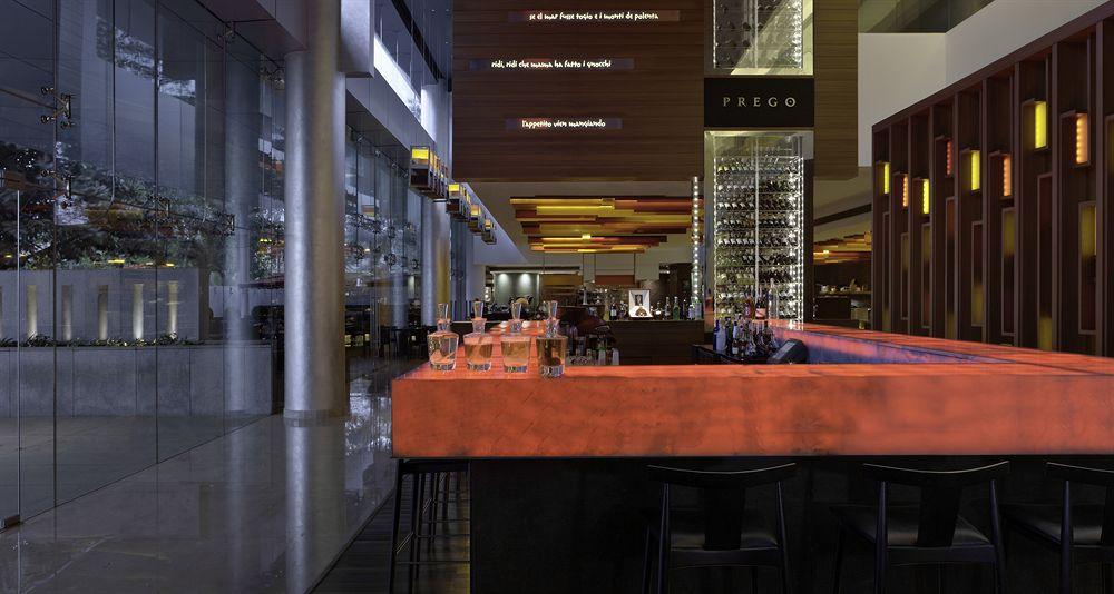 The Westin Mumbai Garden City Bagian luar foto The bar at the restaurant